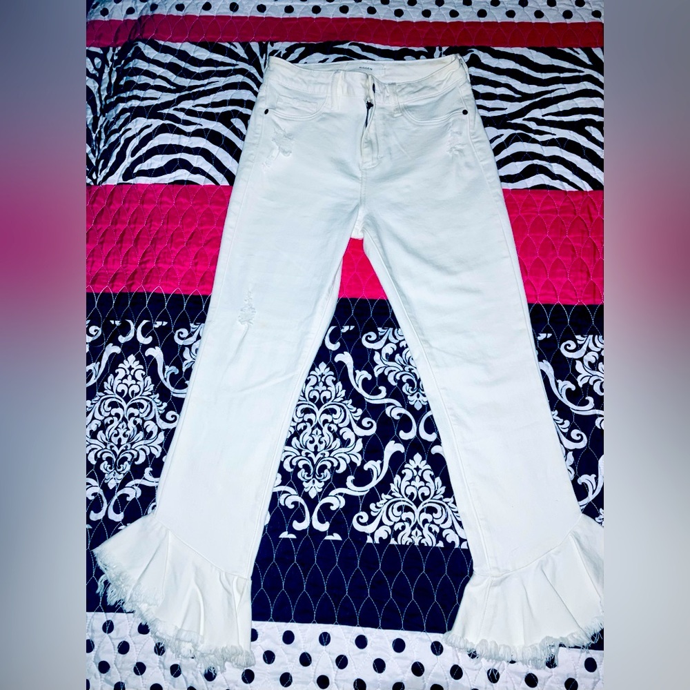 Hidden stretch skinny bell bottom fringe jeans